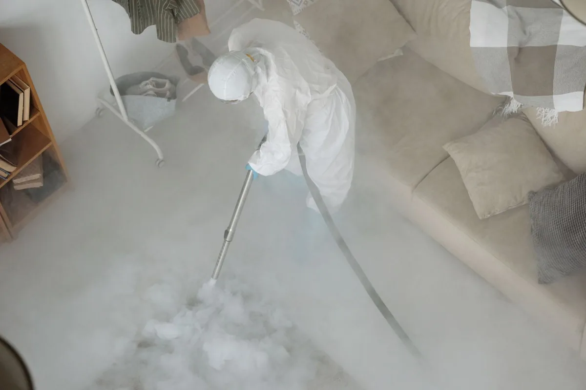 Biohazard cleanup technician in protective equipment, Seneca Knolls, NY